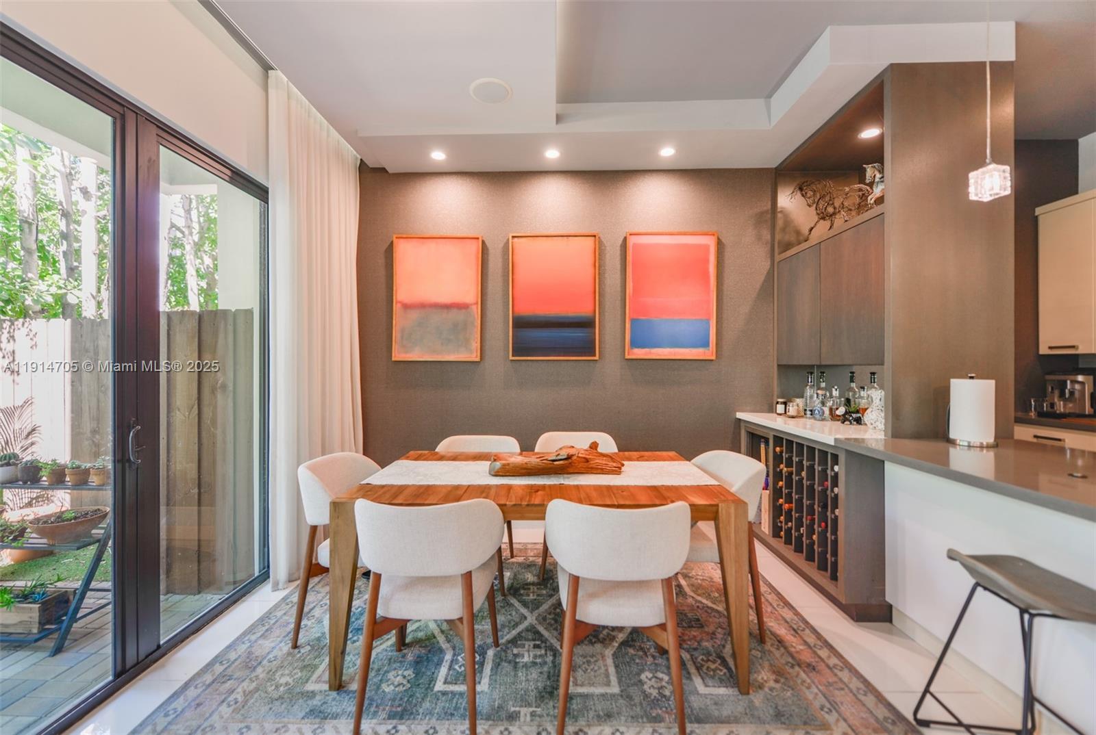 3318 Day Avenue, Unit 7 Miami, FL 33133 - Photo 9 of 39 a dining room with furniture and window