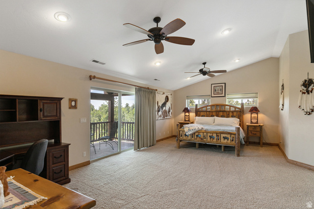 755 South Zion Ridge Drive Orderville, UT 84758 - Photo 65 of 84 Bedroom with multiple windows, light colored carpet, access to outside, a ceiling fan, and vaulted ceiling