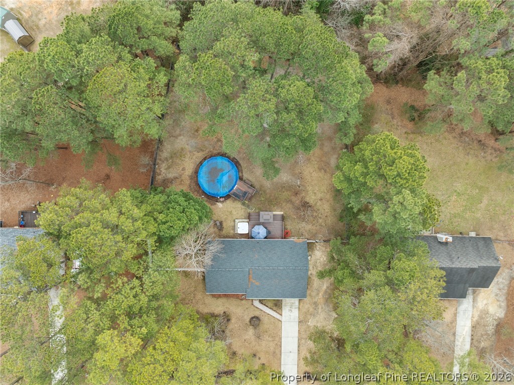 237 Lemuel Black Road Bunnlevel, NC 28323 - Photo 35 of 37 a aerial view of a house with a yard and lake view