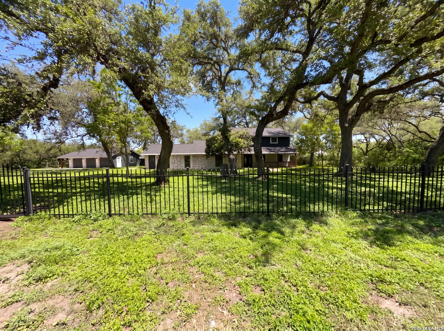 15422 Geronimo Loop San Antonio, TX 78254 - Photo 20 of 21 a view of a yard with plants and trees