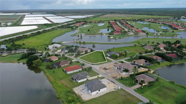 an aerial view of a houses with outdoor space