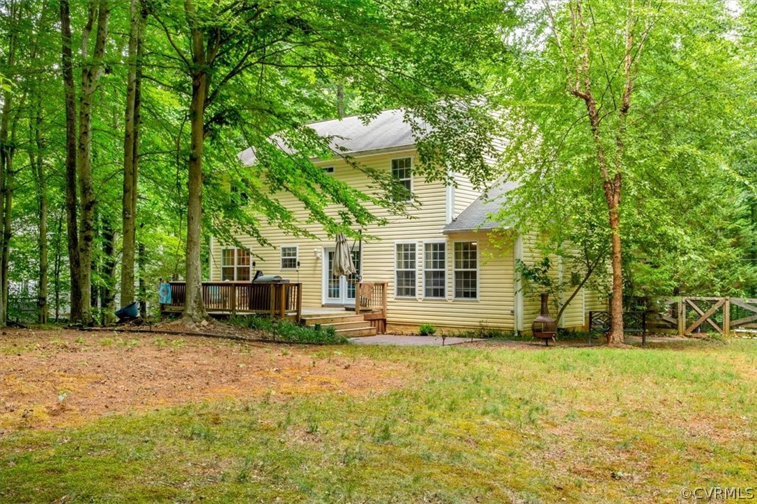 251 Cedar Ridge Drive Ruther Glen, VA 22546 - Photo 24 of 30 a front view of a house with a yard