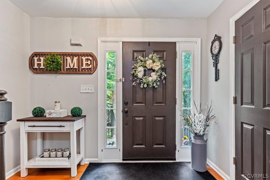 251 Cedar Ridge Drive Ruther Glen, VA 22546 - Photo 8 of 30 a view of an entryway with wooden floor