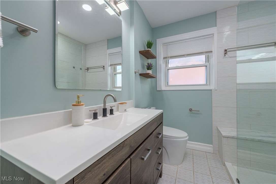 10514 Snow Road Parma, OH 44130 - Photo 19 of 50 Bathroom featuring Custom Walk-In Shower, Tiled Floor