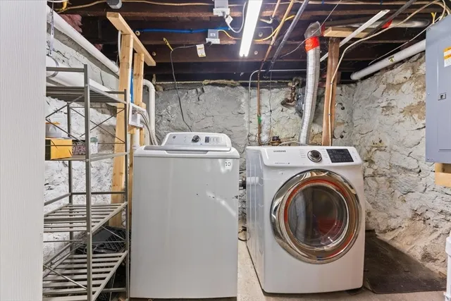 a view of a house with wooden deck