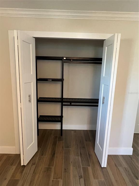 511 West Retta Esplanade Punta Gorda, FL 33950 - Photo 14 of 19 a view of walk in closet with empty racks