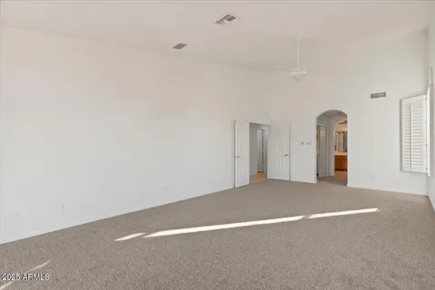a view of a bathroom with a shower and a sink