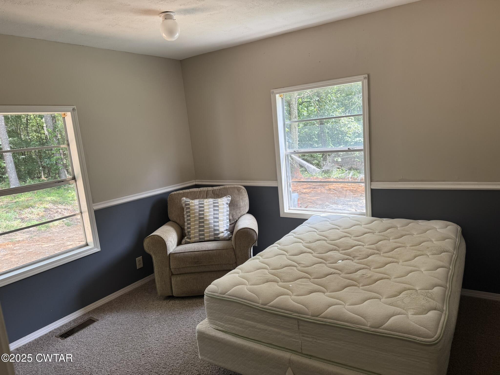 325 Jennings Road Reagan, TN 38368 - Photo 5 of 10 a bedroom with bed and window