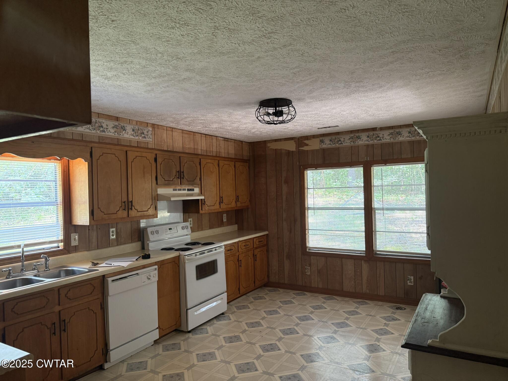 325 Jennings Road Reagan, TN 38368 - Photo 8 of 10 a kitchen with a sink stove and cabinets