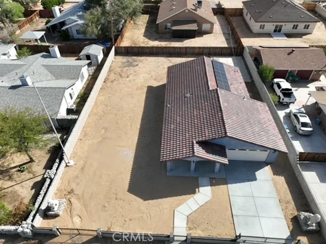 an aerial view of a house with a outdoor space
