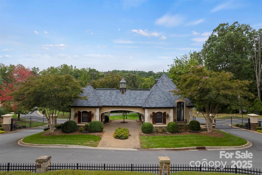 1029 Glade Spring Court Belmont, NC 28012 - Photo 1 of 31 a front view of a house with garden