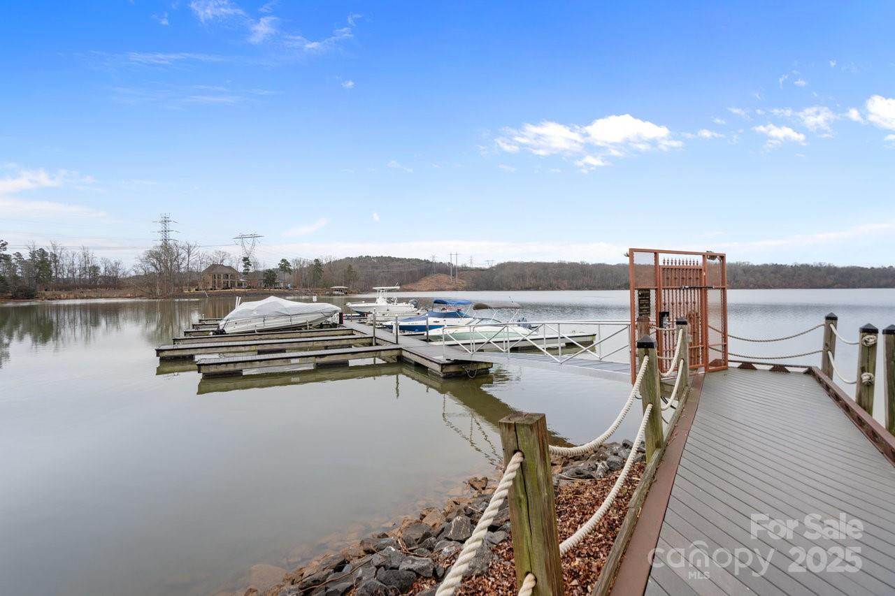 1029 Glade Spring Court Belmont, NC 28012 - Photo 11 of 31 a view of a lake with a terrace