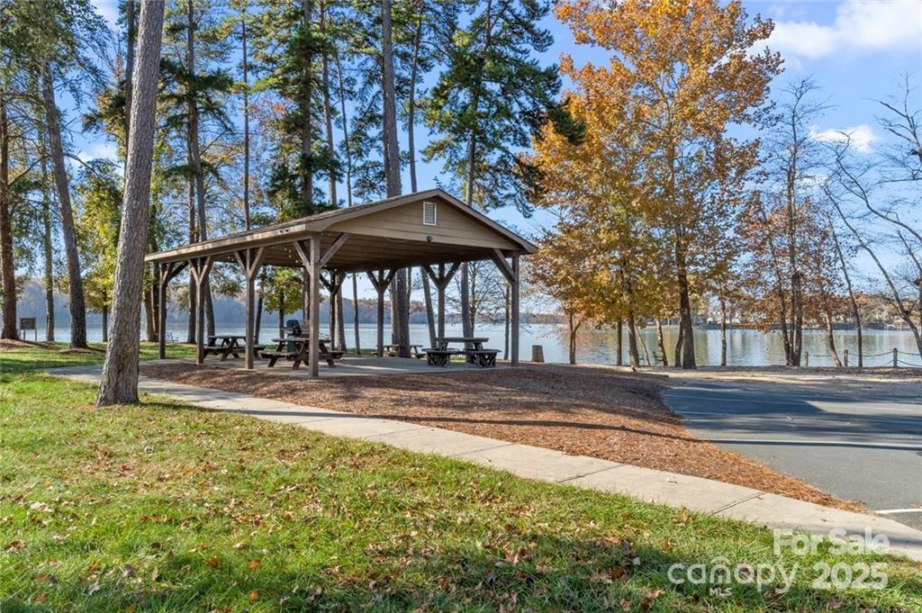 1029 Glade Spring Court Belmont, NC 28012 - Photo 25 of 31 a view of a house with a yard and sitting area