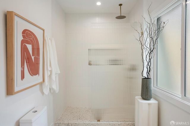 a bathroom with a mirror