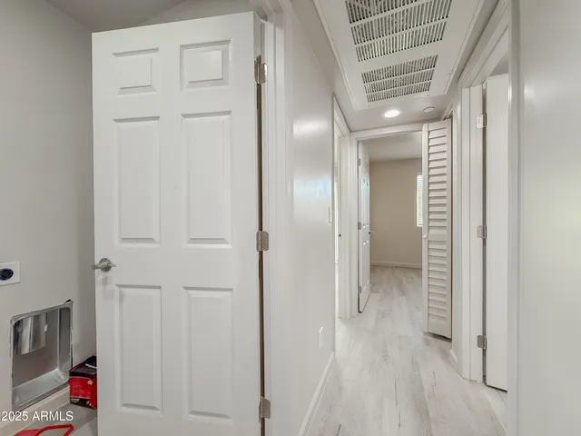 a bathroom with a granite countertop sink a toilet and bathtub