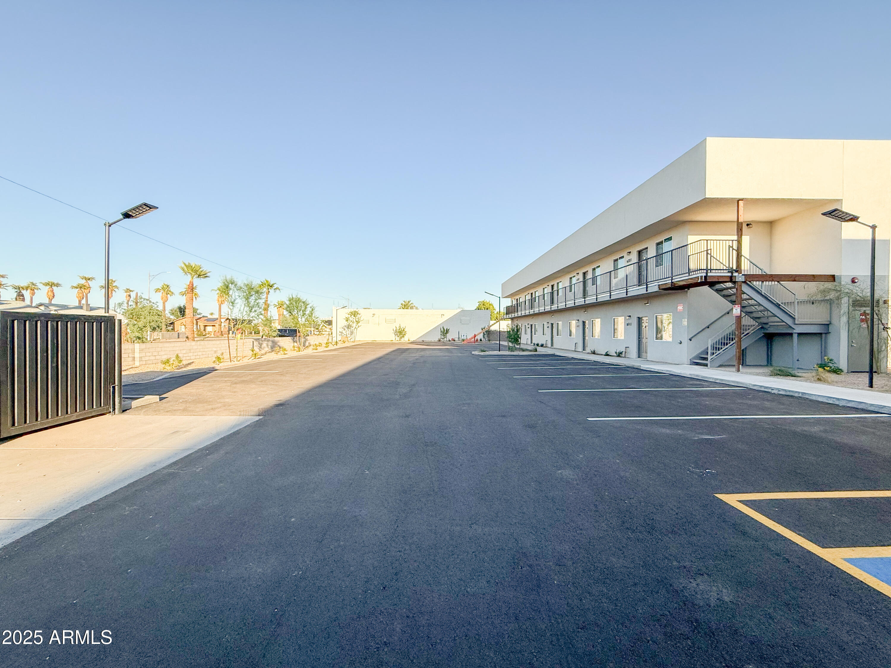 2121 West Adams Street, Unit A103 Phoenix, AZ 85009 - Photo 3 of 22 a view of an ocean & house