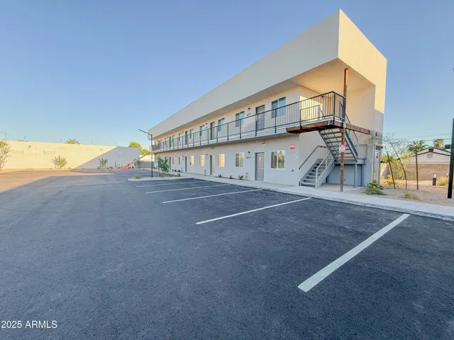 a view of living room filled with furniture