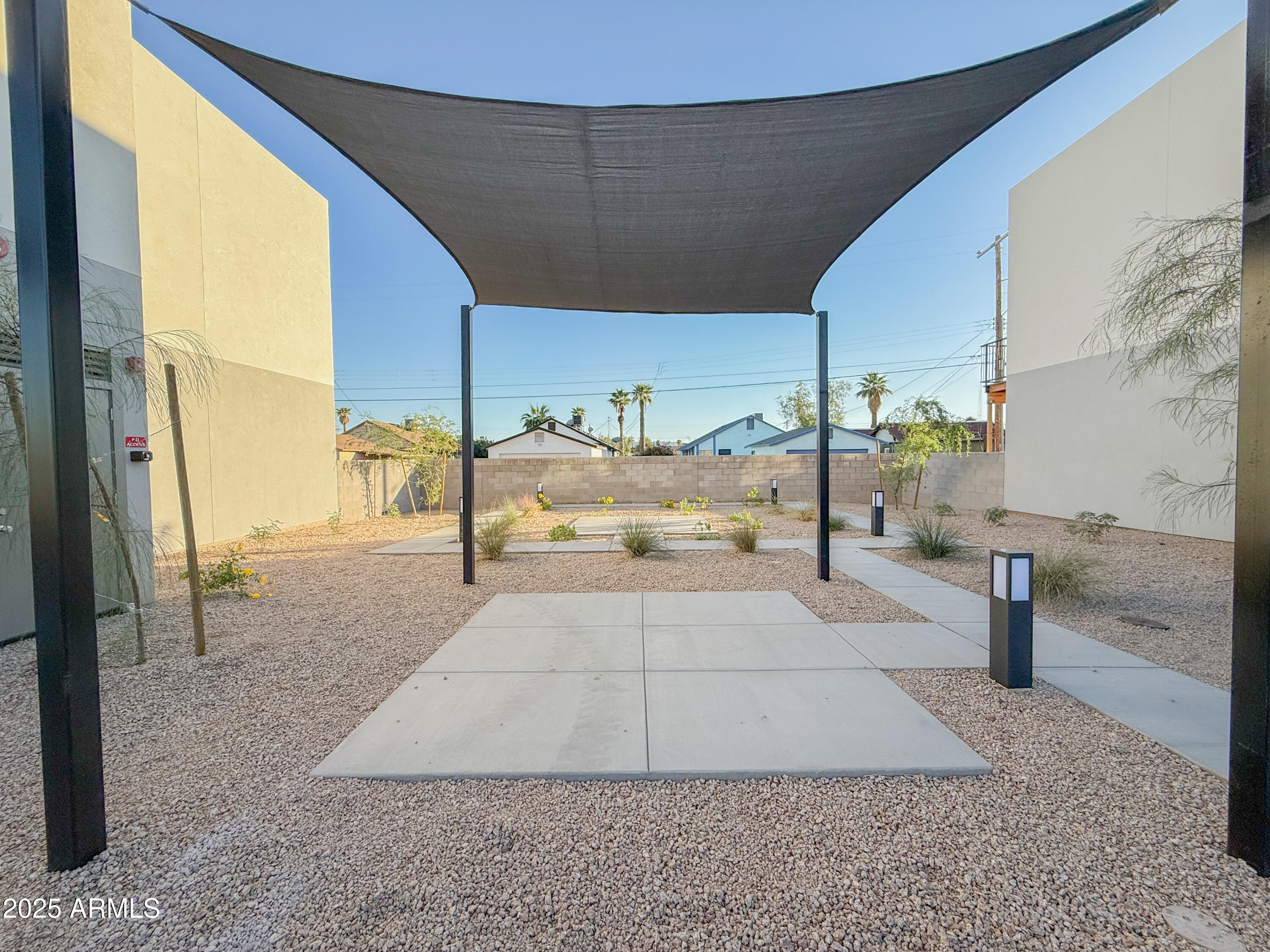 2121 West Adams Street, Unit A103 Phoenix, AZ 85009 - Photo 5 of 22 a view of living room filled with furniture
