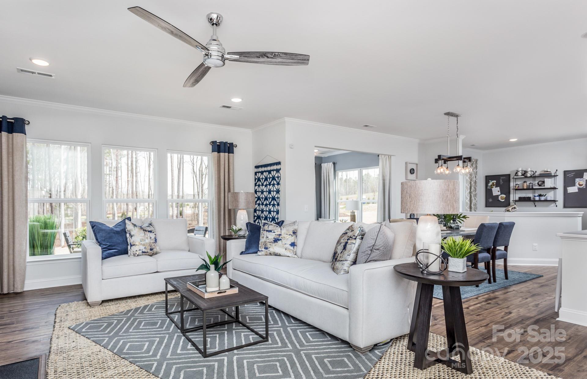 4741 Formation Court, Unit 43 Lancaster, SC 29720 - Photo 5 of 9 a living room with furniture and a large window