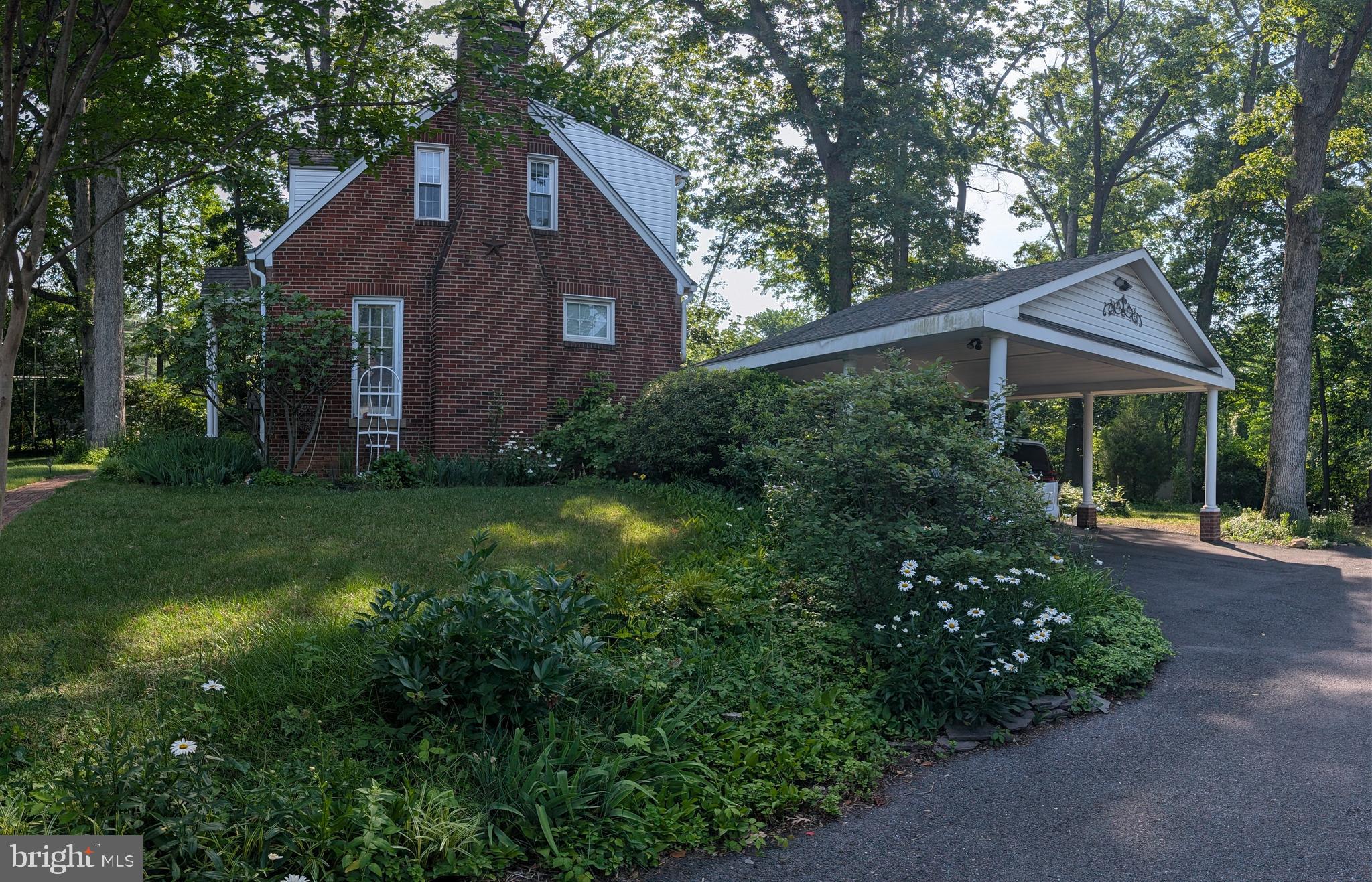 1903 Kirby Road McLean, VA 22101 - Photo 6 of 11 a front view of a house with garden