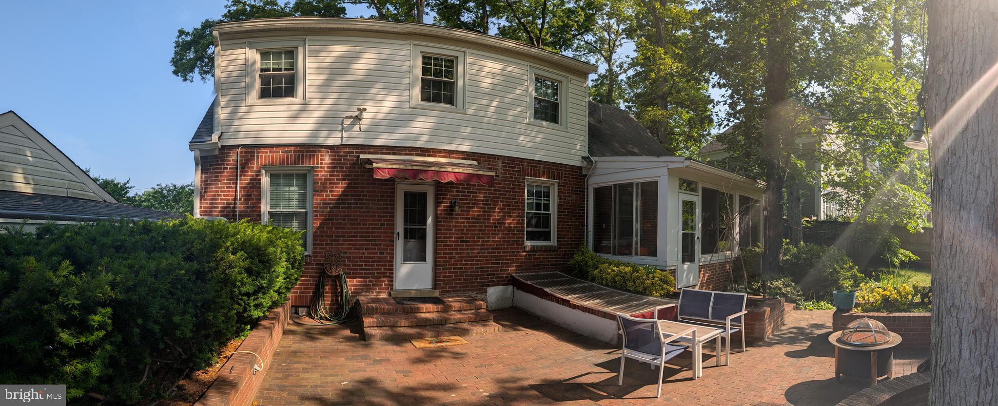 1903 Kirby Road McLean, VA 22101 - Photo 9 of 11 a front view of a house with patio