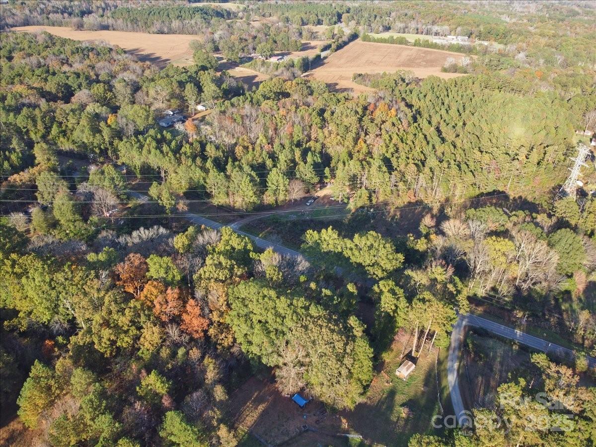11484 Bethel Church Road Midland, NC 28107 - Photo 21 of 30 a view of a garden with an umbrella