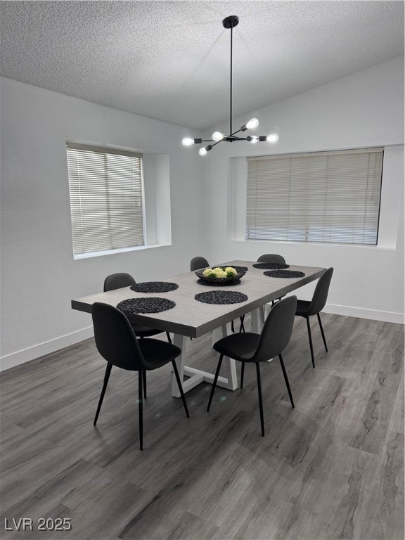 2044 Waverly Circle Henderson, NV 89014 - Photo 3 of 14 Dining room with a notable chandelier, wood finish