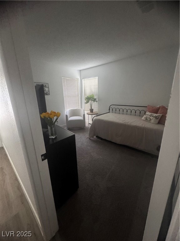 2044 Waverly Circle Henderson, NV 89014 - Photo 5 of 14 Carpeted bedroom with a textured ceiling and baseb