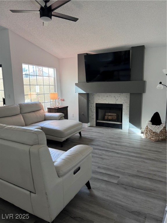 2044 Waverly Circle Henderson, NV 89014 - Photo 8 of 14 Living room with a textured ceiling, a ceiling fan