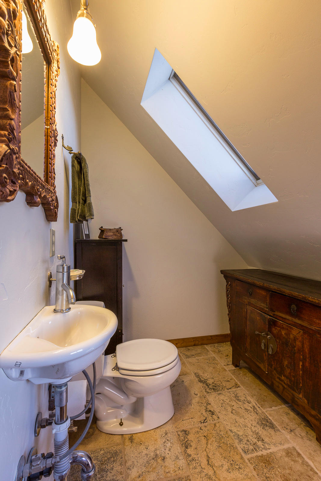 799 Harcourt Trail Placerville, CO 81430 - Photo 12 of 29 a bathroom with a sink and a toilet