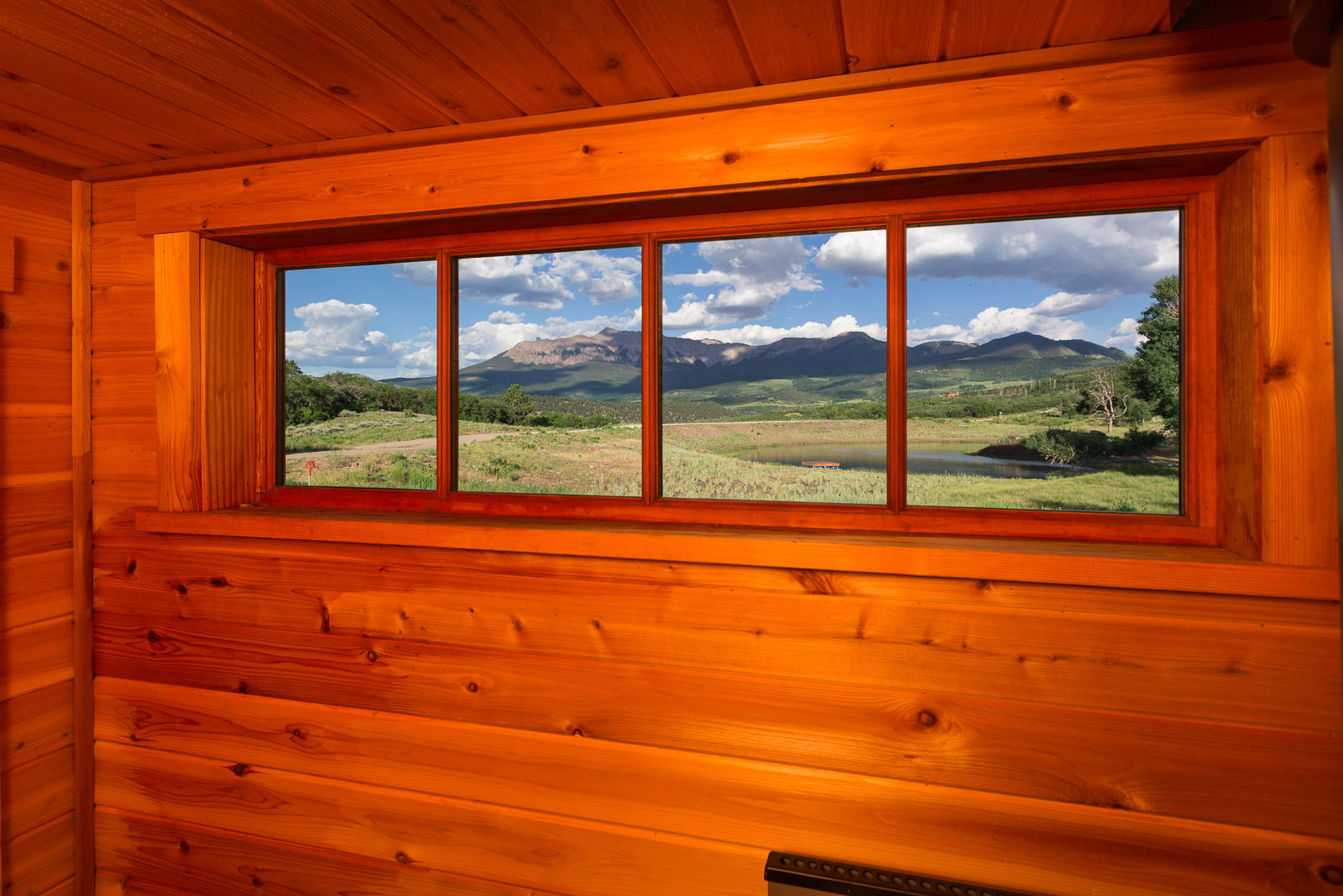 799 Harcourt Trail Placerville, CO 81430 - Photo 14 of 29 a view of a large window with an outdoor view