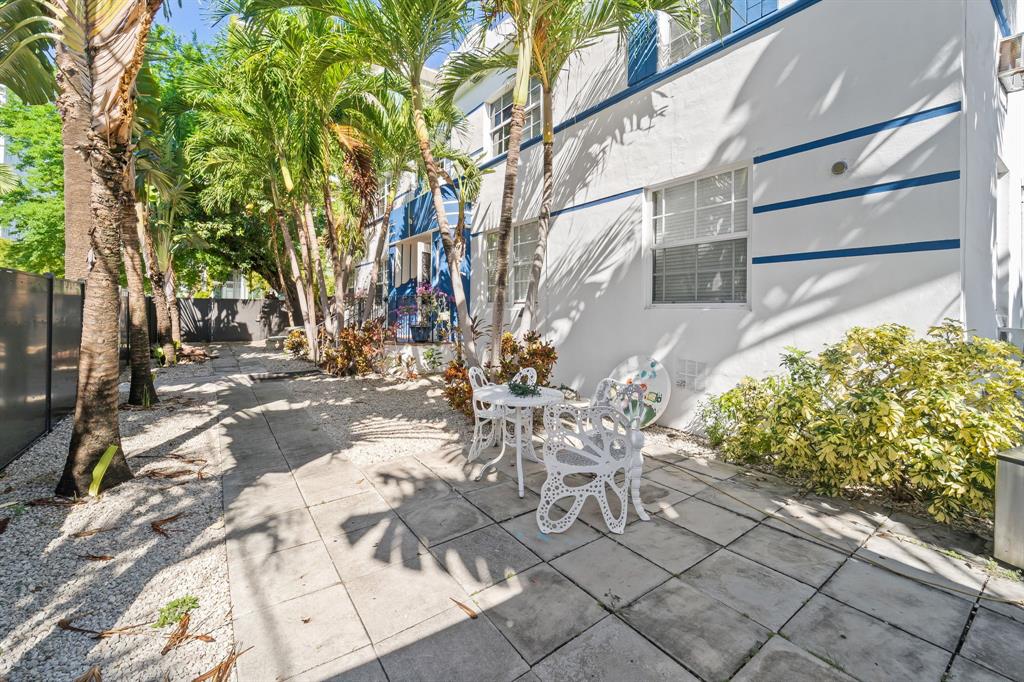 1241 13th Street, Unit 4 Miami Beach, FL 33139 - Photo 16 of 19 a view of yard with patio