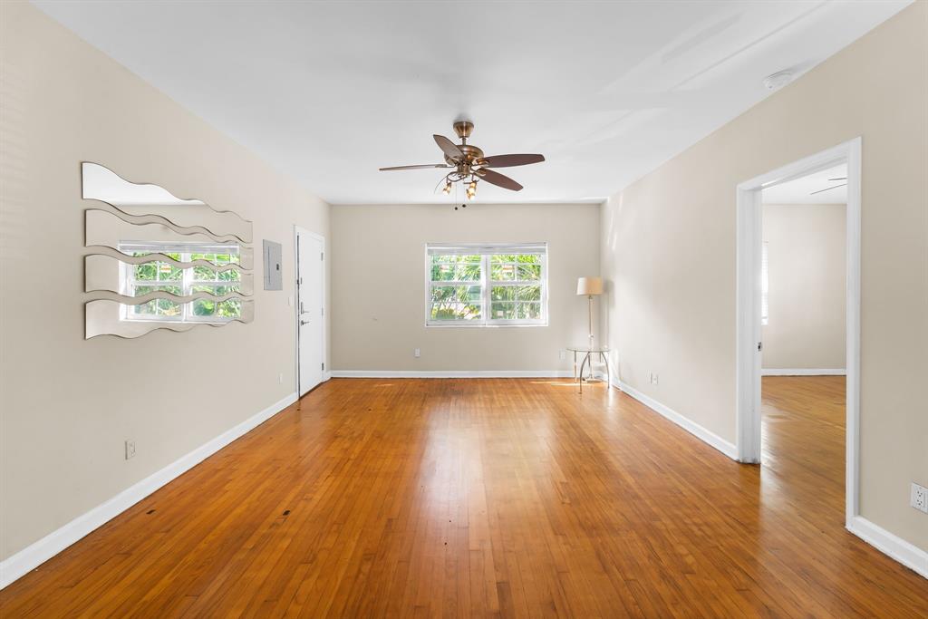 1241 13th Street, Unit 4 Miami Beach, FL 33139 - Photo 8 of 19 an empty room that has a window
