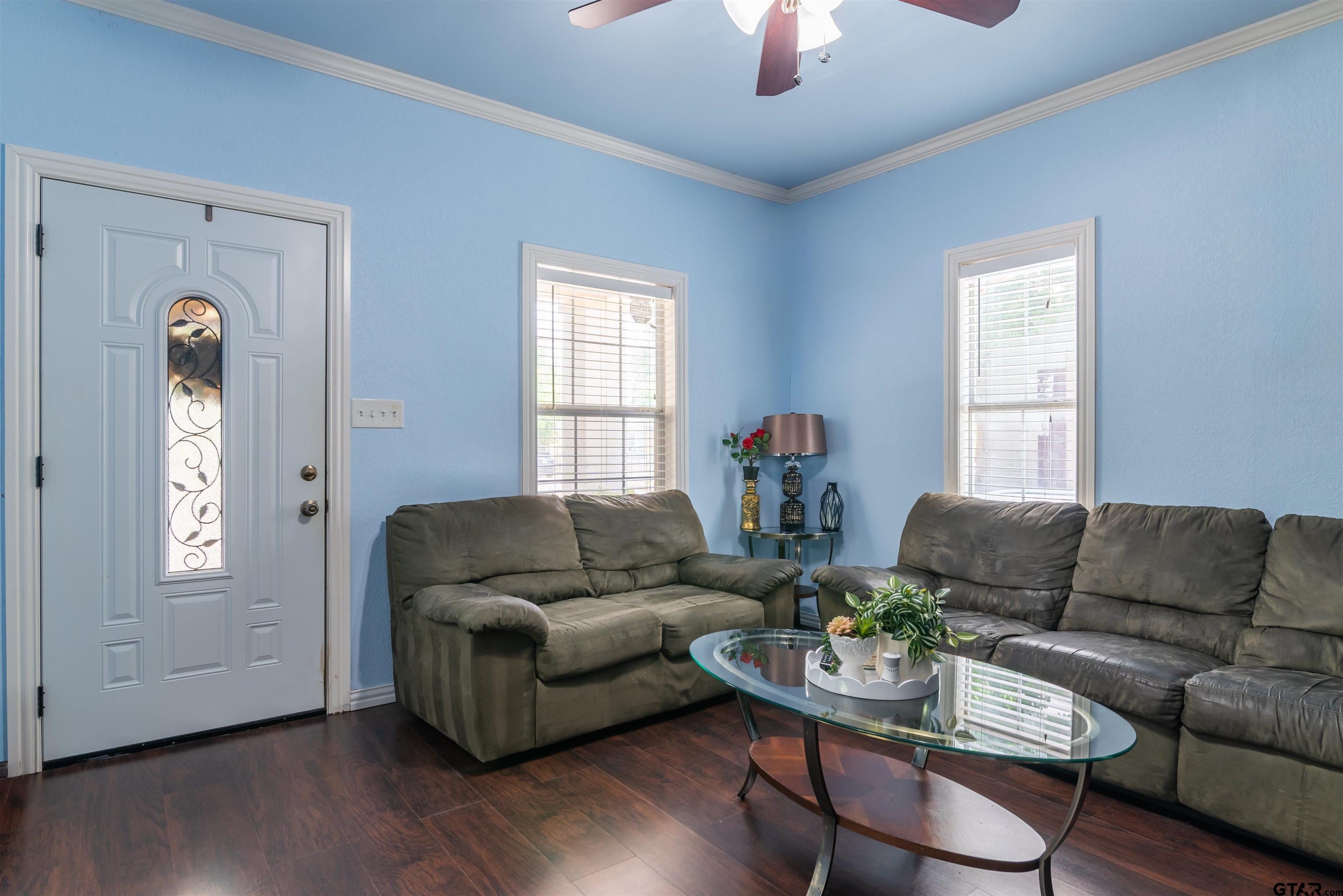 427 East Locust Street Tyler, TX 75702 - Photo 5 of 42 a living room with furniture and a window