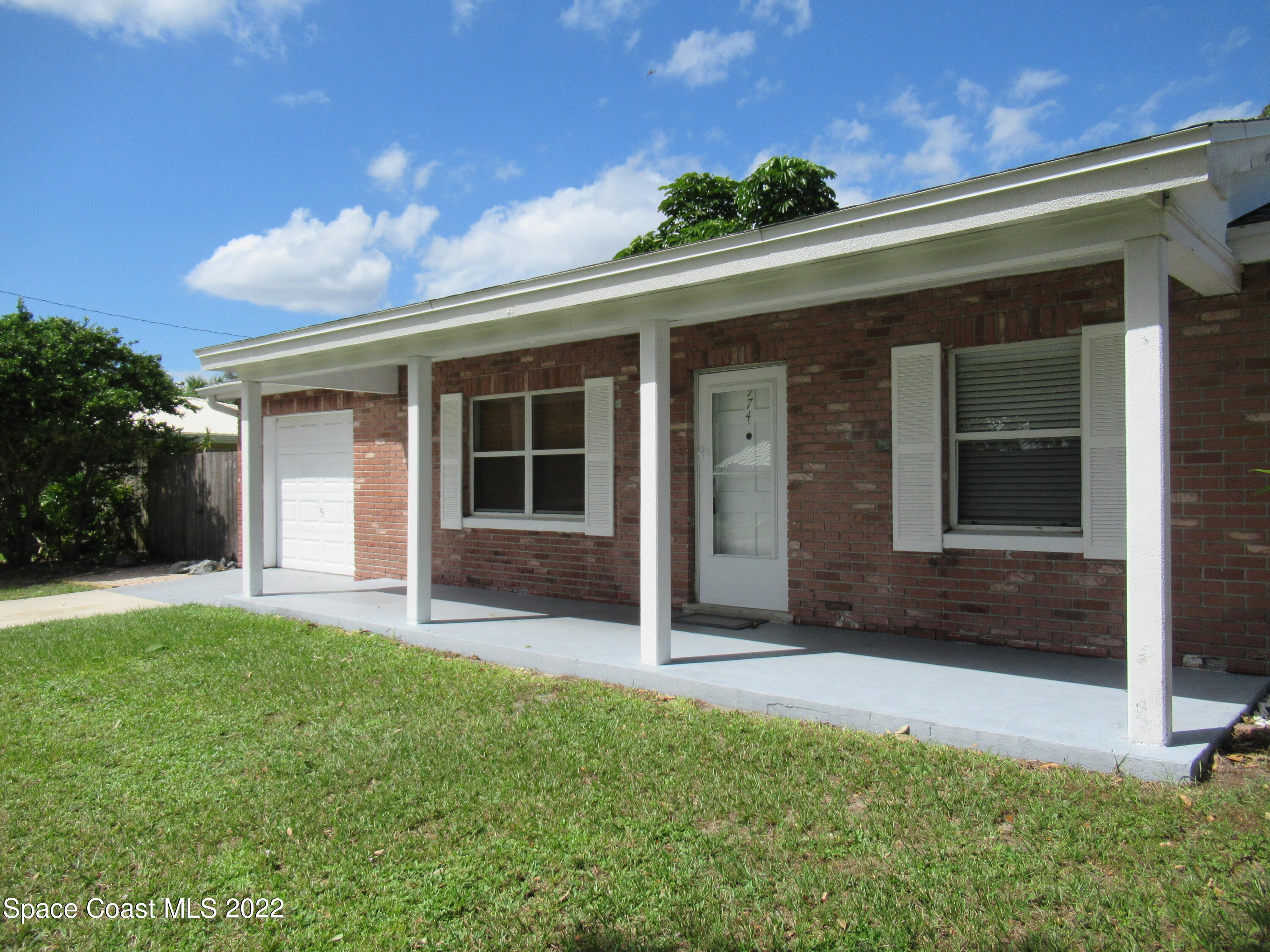 974 Bucknell Place Rockledge, FL 32955 - Photo 2 of 30 a view of a porch with a yard