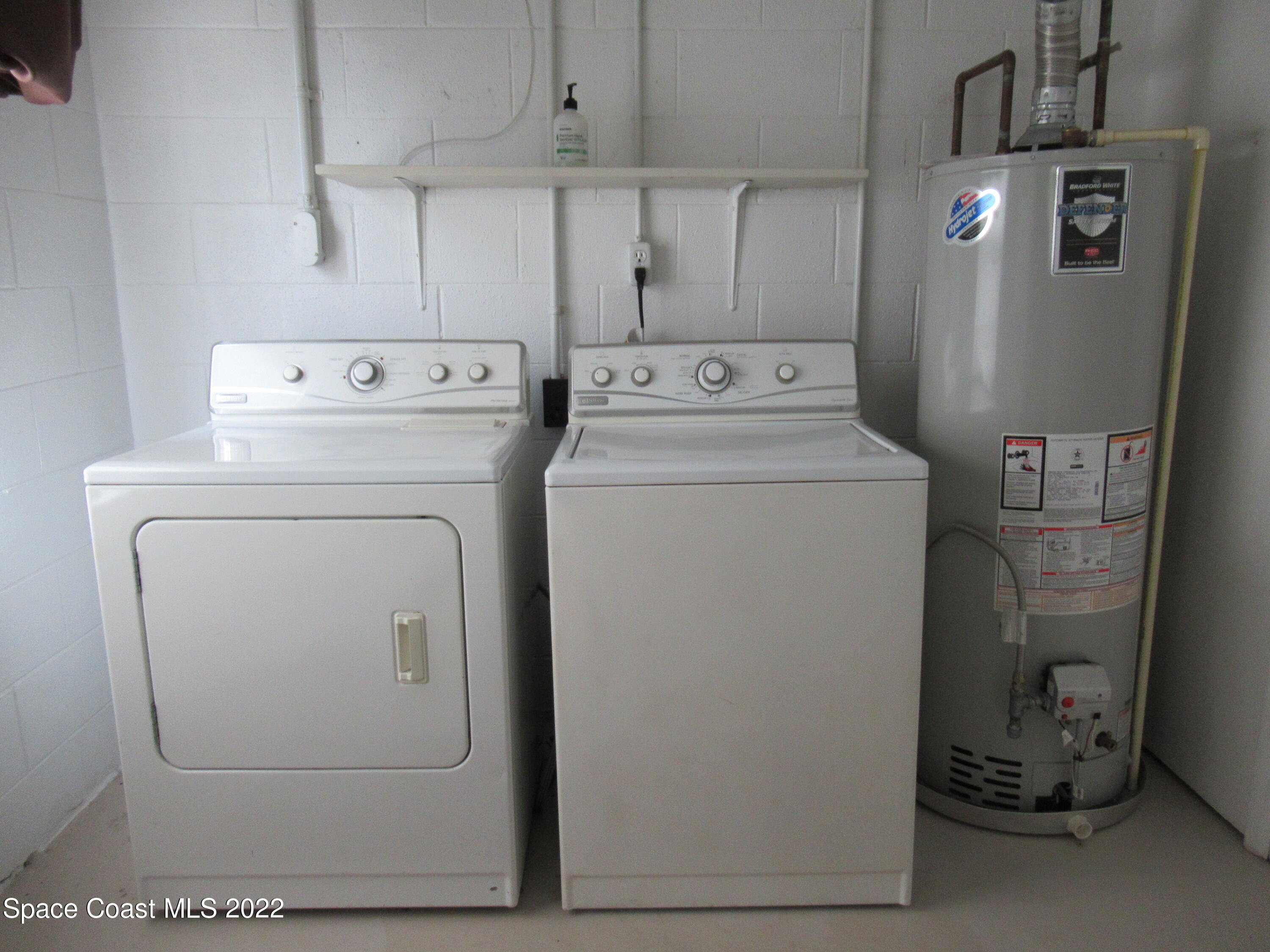 974 Bucknell Place Rockledge, FL 32955 - Photo 21 of 30 a utility room with dryer and washer