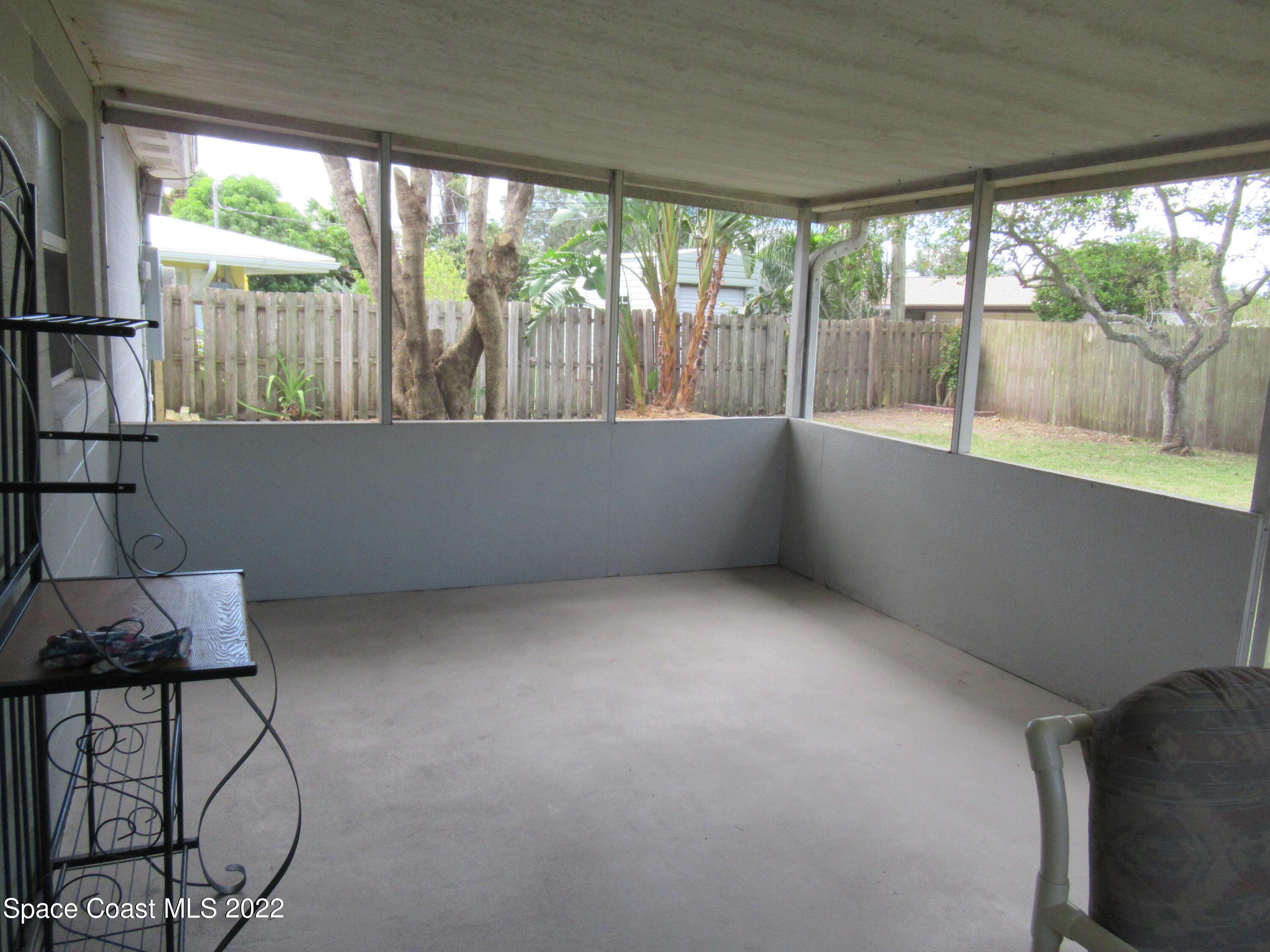 974 Bucknell Place Rockledge, FL 32955 - Photo 24 of 30 a view of room with furniture and windows