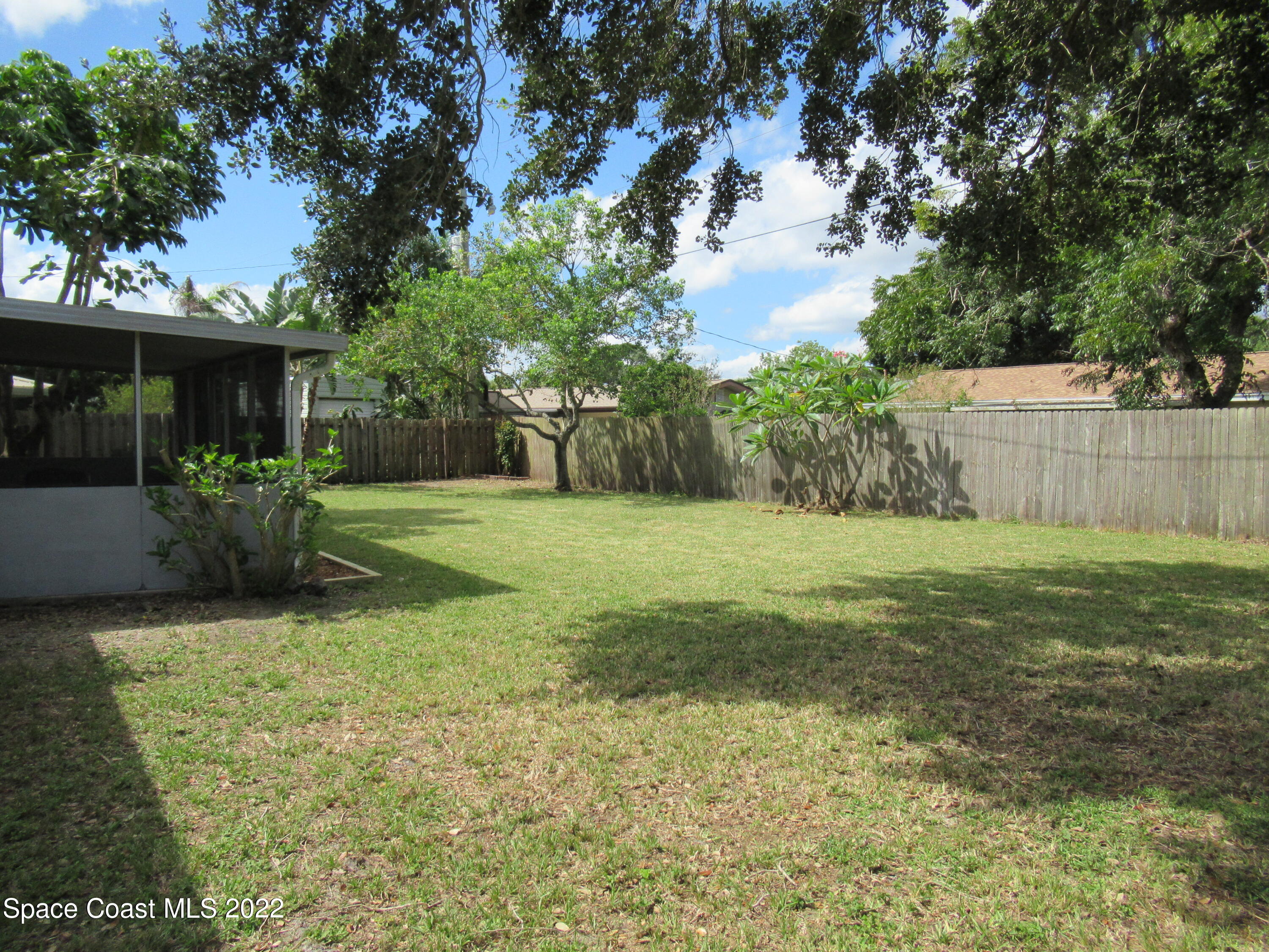 974 Bucknell Place Rockledge, FL 32955 - Photo 29 of 30 a view of a backyard