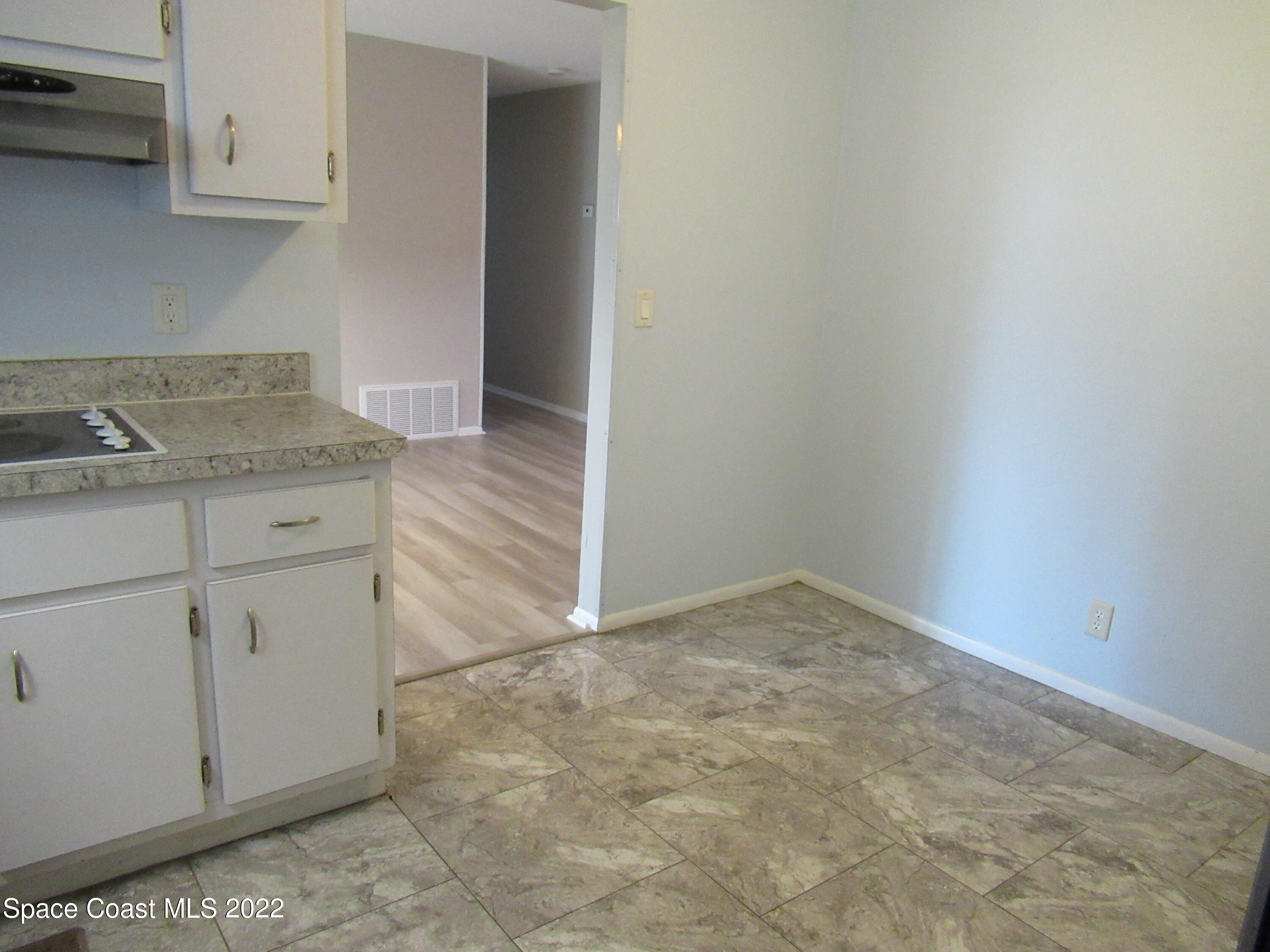 974 Bucknell Place Rockledge, FL 32955 - Photo 10 of 30 a kitchen with a stove