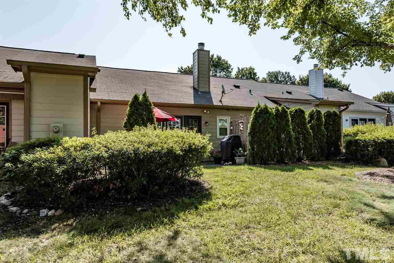 2603 Cottage Circle Raleigh, NC 27613 - Photo 25 of 25 a view of a house with a garden