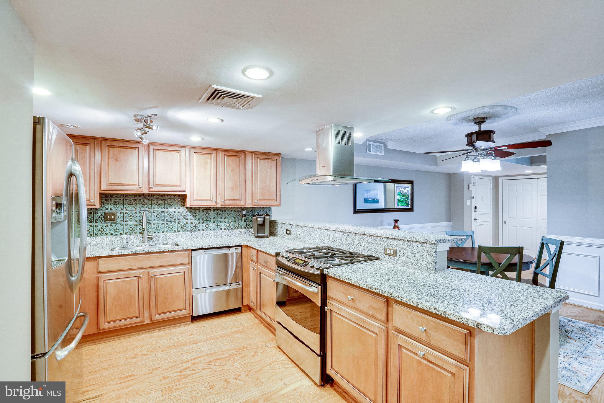 1515 South Arlington Ridge Road, Unit 403 Arlington, VA 22202 - Photo 13 of 43 Updated kitchen with stainless steel appliances