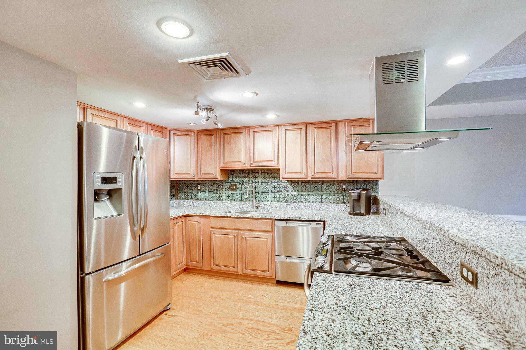 1515 South Arlington Ridge Road, Unit 403 Arlington, VA 22202 - Photo 14 of 43 Beautiful maple cabinets