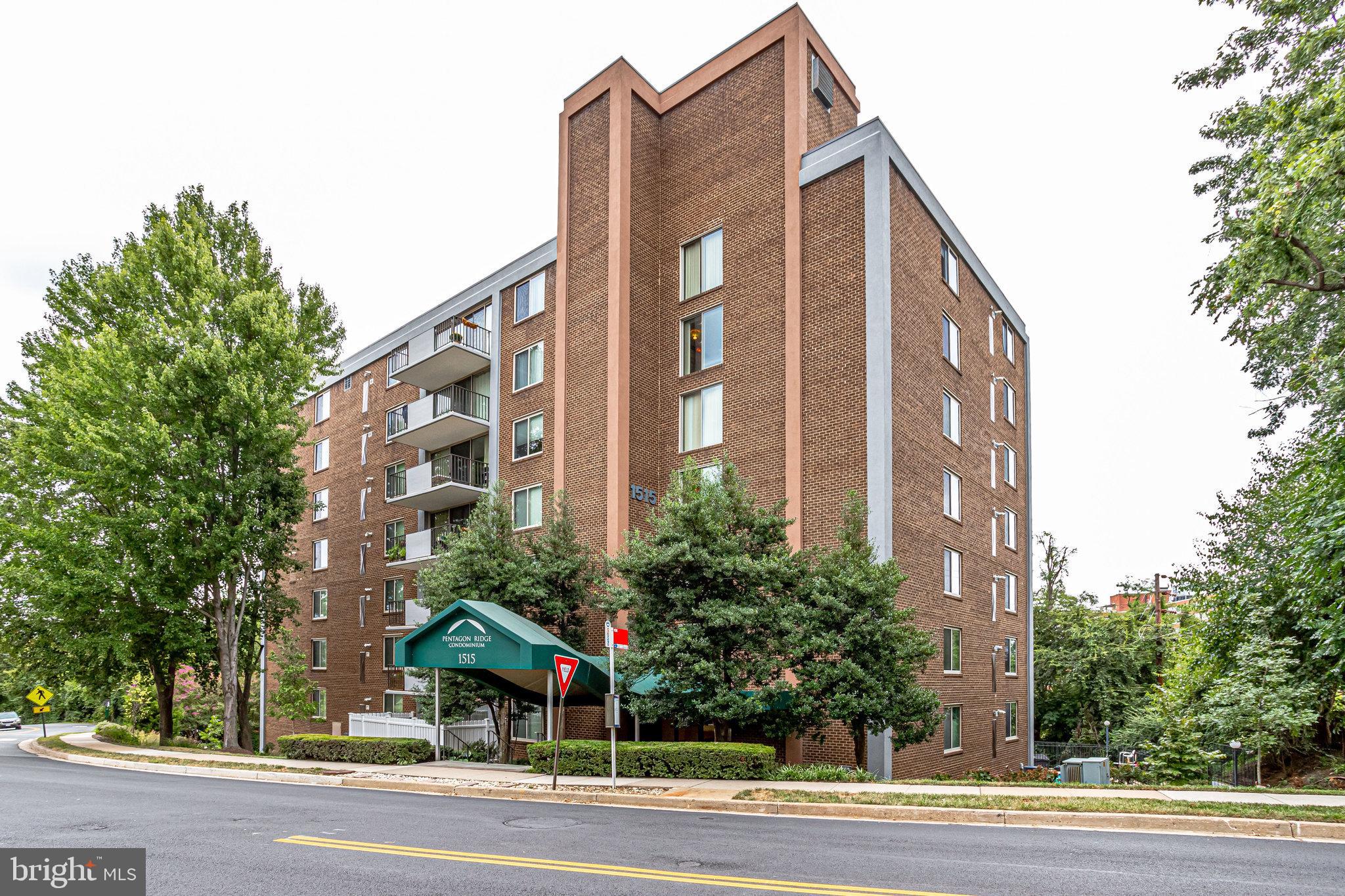 1515 South Arlington Ridge Road, Unit 403 Arlington, VA 22202 - Photo 2 of 43 Front of bldg + a bus stop