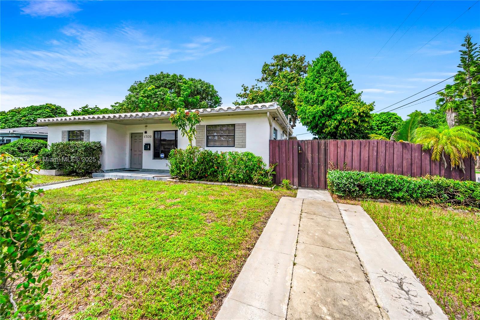 17130 Northeast 7th Avenue North Miami Beach, FL 33162 - Photo 35 of 38 front view of a house with yard