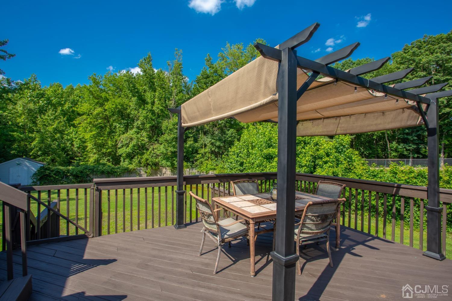 357 Pleasant Valley Road Old Bridge, NJ 08857 - Photo 44 of 55 a view of a chairs and table in the deck