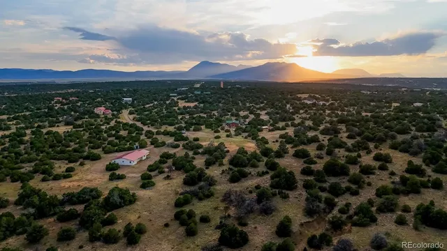 a view of a city with mountain
