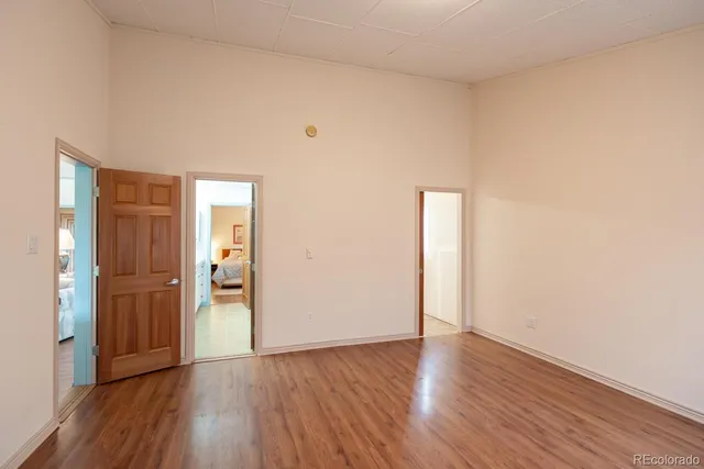 a bathroom with a sink vanity mirror and toilet