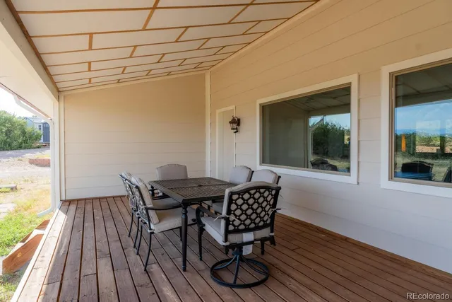 a view of swimming pool from a balcony
