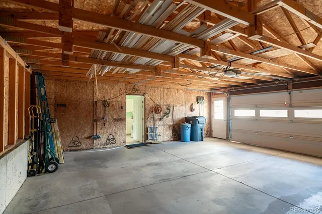 a view of a house with a yard and plants