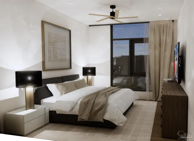 a bedroom with a bed and a flat screen tv